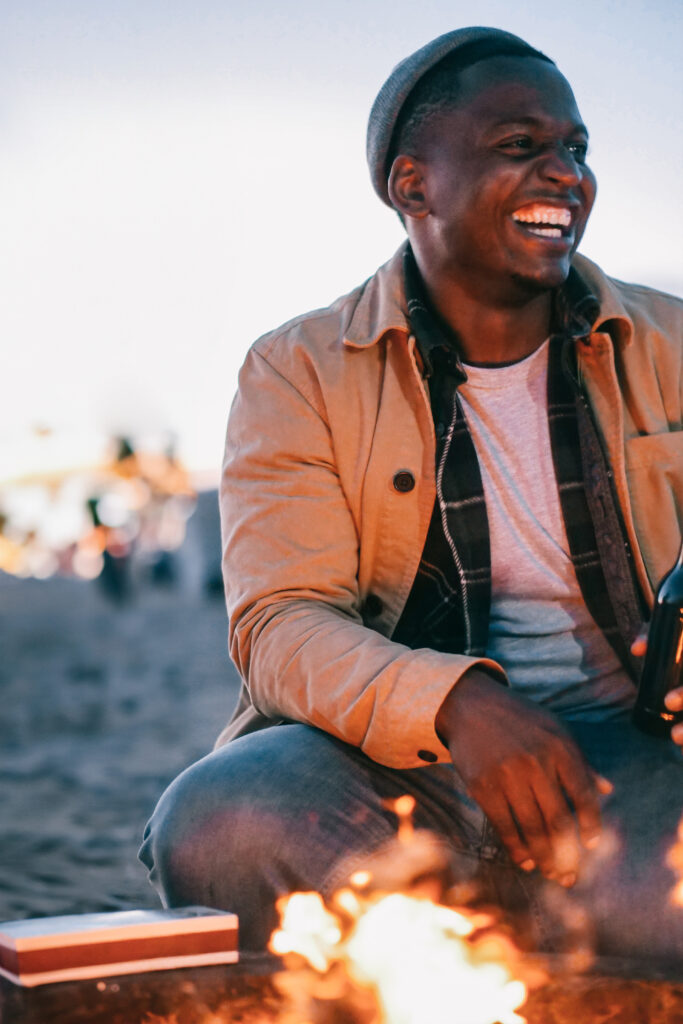 Man sitting in front of fire place